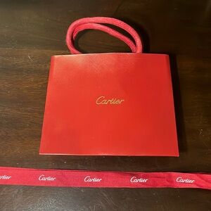 Authentic cartier gift bag and ribbon- see images for approx measurments